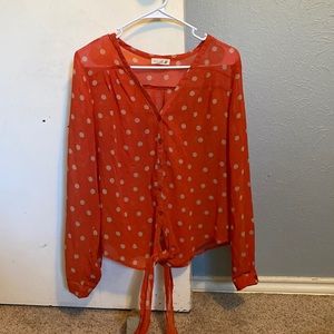Orange and white polka top blouse